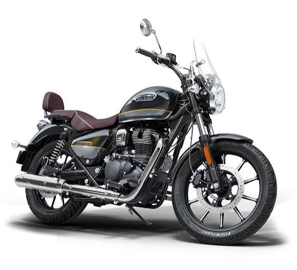 Stock Royal Enfield Meteor 350 in black and chrome, with a brown seat, backrest and small windscreen
